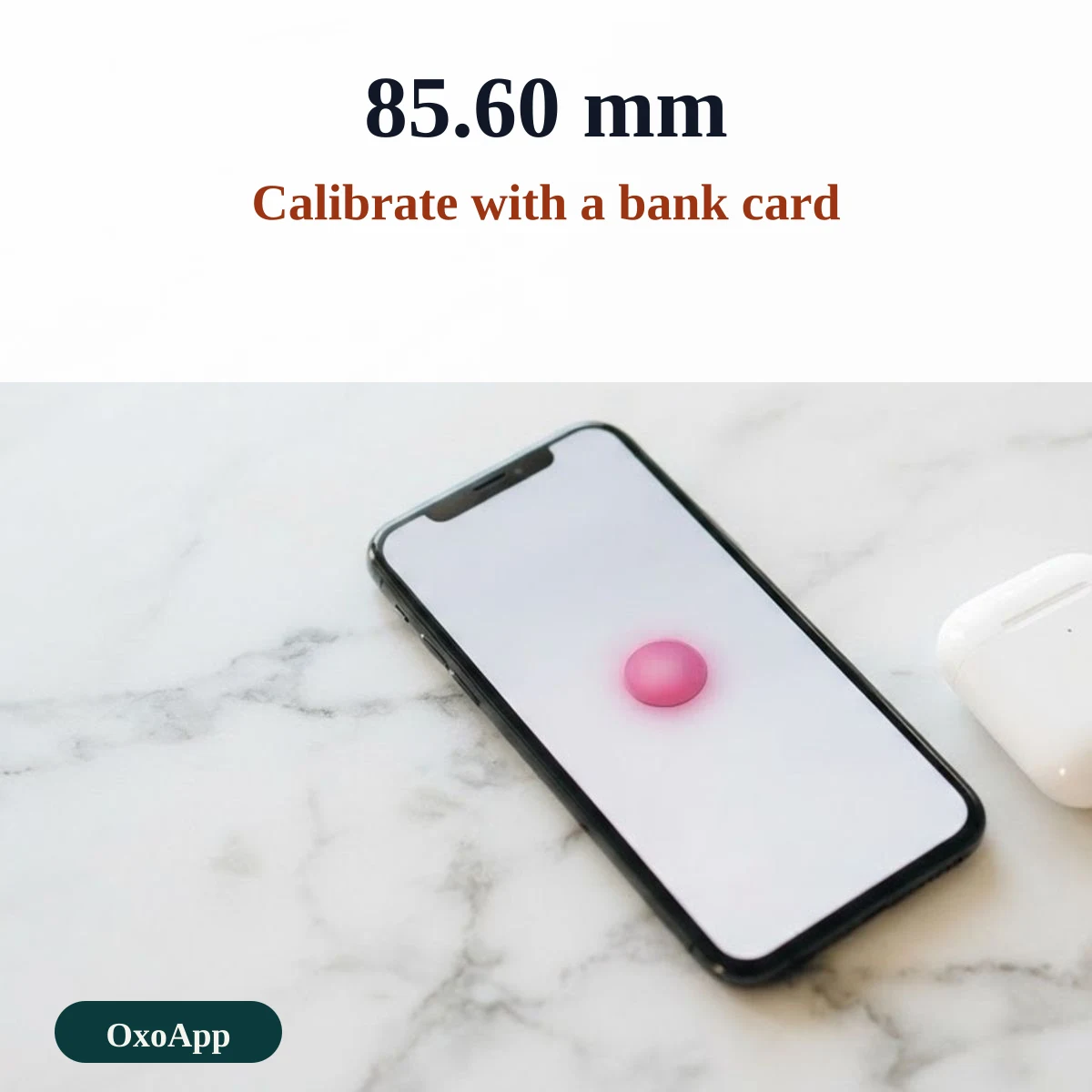Calibrating the ruler with a bank card that is 85.60 millimetres wide