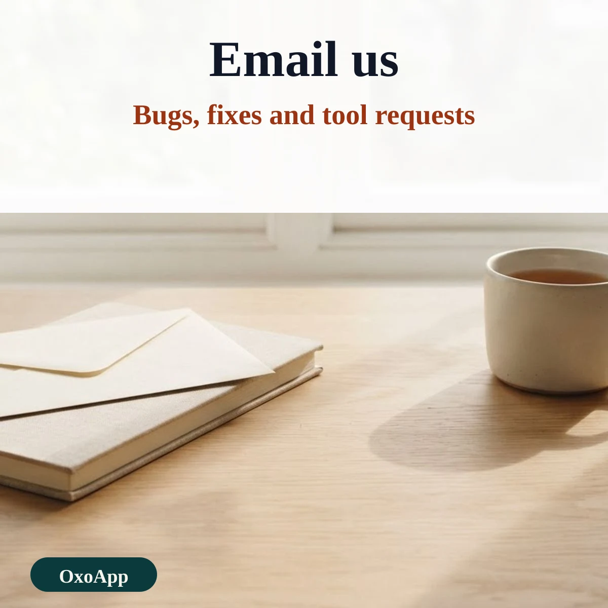 An envelope on a notebook beside a cup on a sunlit desk, for emailing OxoApp
