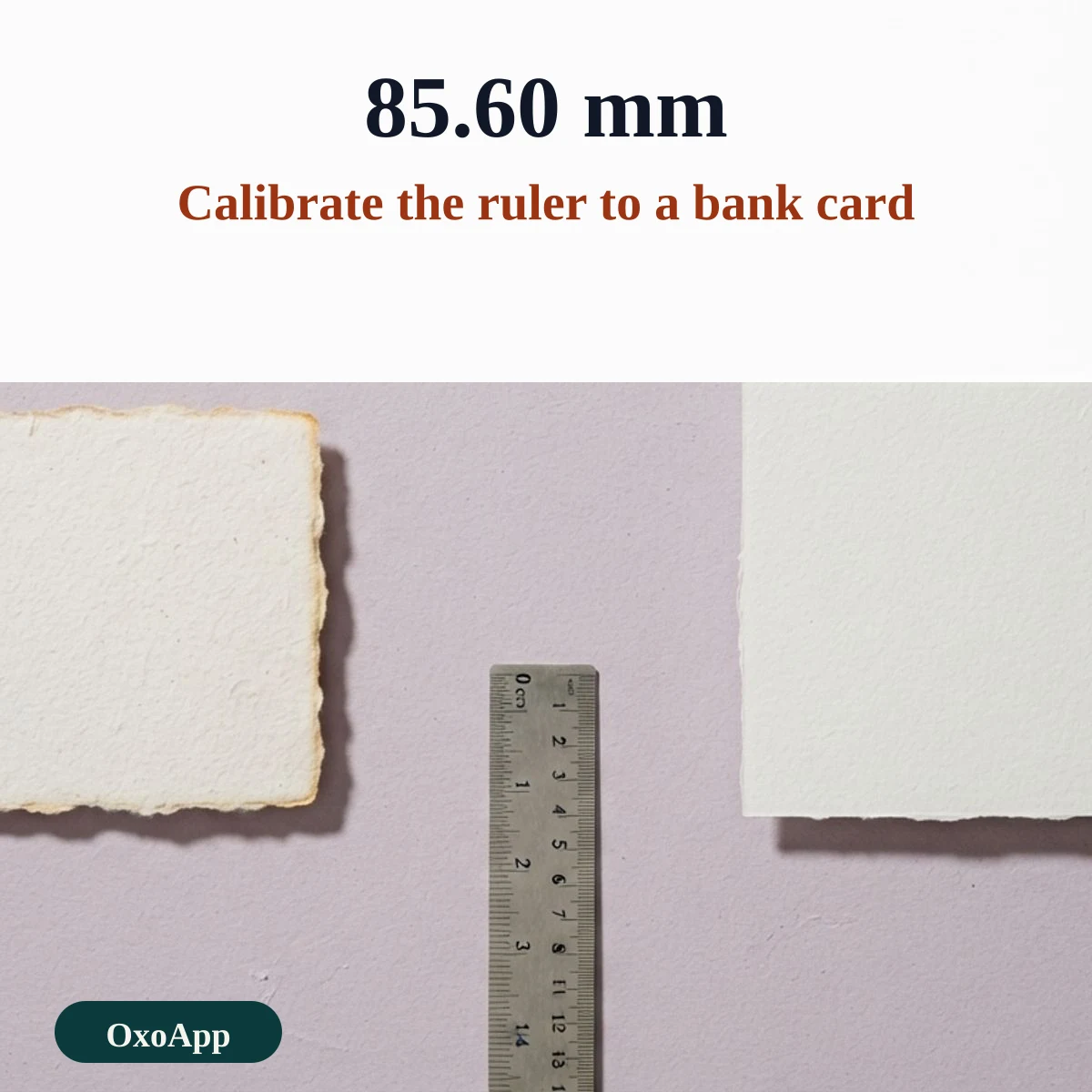 Calibrating the on-screen ruler against a bank card that is 85.60 mm wide
